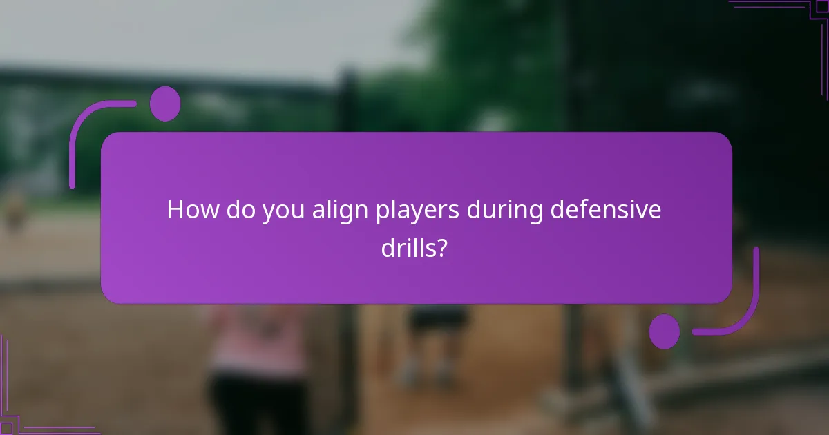 How do you align players during defensive drills?
